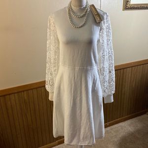 Hailey LYN white dress with beautiful lace sleeves. Size PM